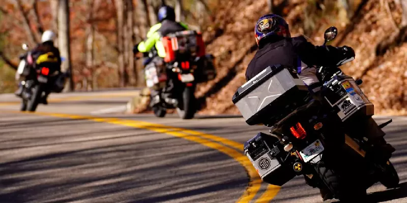 What should you prepare as a beginner before motorcycle trips?